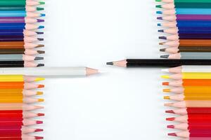 Multi-colored pencils in a row photo