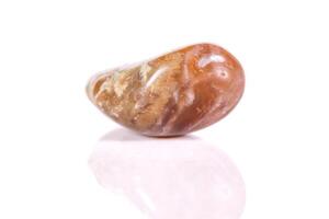 Macro mineral stone jasper on a white background photo