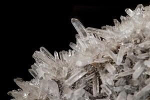 Macro mineral stone sulfite quartz on a black background photo