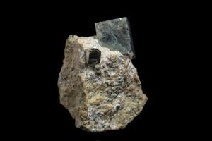 Macro Pyrite mineral stone on black background photo