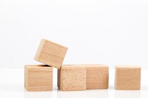 Wooden cubes on a white background photo