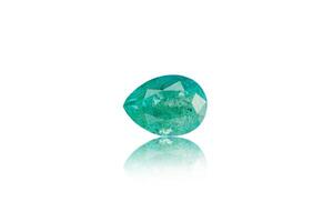 macro mineral stone cut emerald on a white background photo