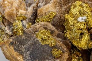 Macro mineral stone Barit Pyrit on a white background photo