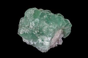 macro mineral fluorite stone on balck background photo