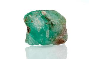 macro mineral stone emerald on a white background photo