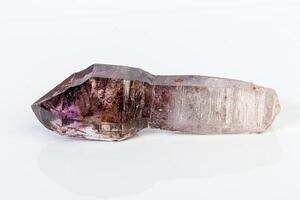 macro mineral stone Amethyst on smoky quartz on a white background photo