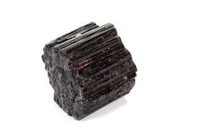 macro mineral stone schorl, black tourmaline on white background photo