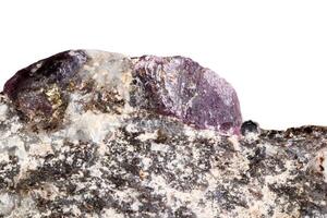 Macro of a mineral Ruby stone on a white background photo