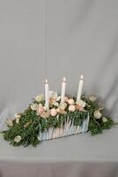 Christmas composition of flowers and Christmas decorations photo