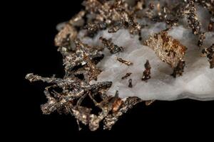 Macro stone mineral silver metal in the rock on a black background photo