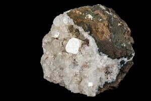 Macro stone Stilbite mineral on white black close up photo