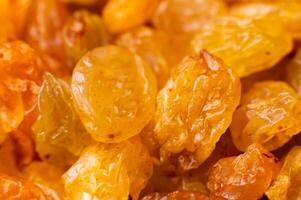 background of raisins in sale in the shop of dried fruit photo