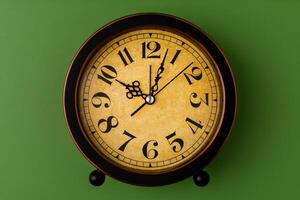 Time and a clock that stops, a photo of a clock in the studio, an important time concept in work and life.