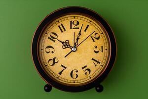 Time and a clock that stops, a photo of a clock in the studio, an important time concept in work and life.