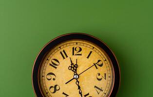 Time and a clock that stops, a photo of a clock in the studio, an important time concept in work and life.