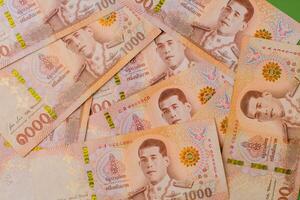 Thai money, Thai banknotes, cash flow, investing and financial planning and returns on stock investments photo