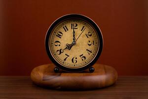 Time hand shows standing time. High quality studio photo of a clock. The concept of time and the rules of time in work