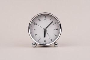 Time hand shows standing time. High quality studio photo of a clock. The concept of time and the rules of time in work