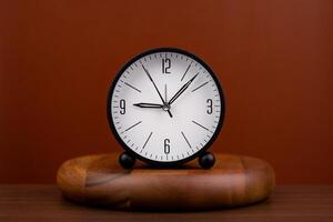 Time hand shows standing time. High quality studio photo of a clock. The concept of time and the rules of time in work