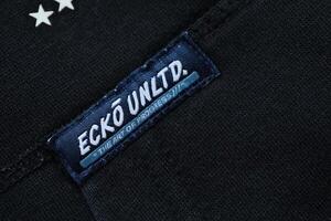 KYIV, UKRAINE - 4 MAY, 2023 Ecko Unltd company logo on new brand clothes photo