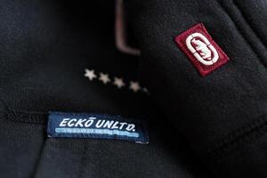 KYIV, UKRAINE - 4 MAY, 2023 Ecko Unltd company logo on new brand clothes photo