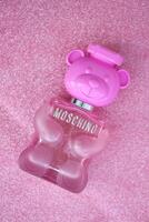 KYIV, UKRAINE - 4 MAY, 2023 Bottle of Toy bubble gum perfume by Moschino, is an Italian luxury fashion house founded in 1983 by Franco Moschino photo