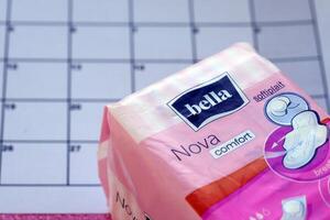 KYIV, UKRAINE - 4 MAY, 2023 Bella menstrual pads pack. Brand packet of period pads photo