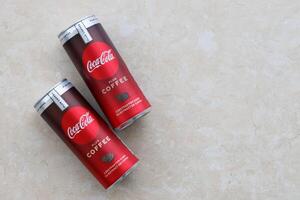KYIV, UKRAINE - OCTOBER 31, 2023 Can of Coca Cola with coffee flavor. Closed tin can of drink with special design photo