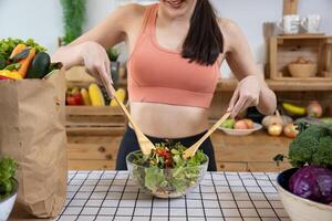 Asian housewife is preparing simple and easy japanese style salad meal for vegan and vegetarian food concept after exercise to get enough nutrition photo