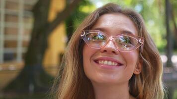 Close-up portrait smiling blonde woman video