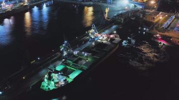 AERIAL Closed loading of coal on a large cargo ship at a modern coal terminal video