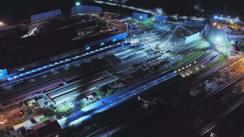 Aerial view of a modern indoor coal terminal at night video