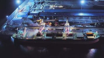 AERIAL Closed loading of coal on a large cargo ship at a modern coal terminal video