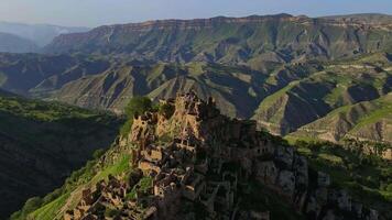 Medieval stone ruins of the ancient village on the top of the mountain video