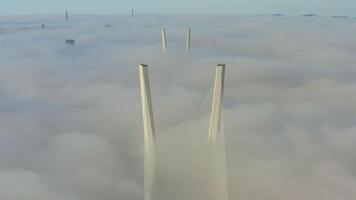 Tops of the pylons of the Golden Bridge in the dawn fog video