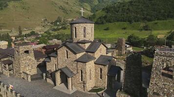 AERIAL. Holy Dormition Alan Monastery in Khidikus village at sunset video