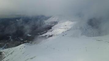 Aerial view of the southern slope of the Aibga ridge with a ski lift video