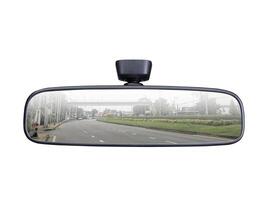 A rear view mirror with a picture of the road in it photo
