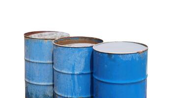 Blue old barrels contain water, isolated on white background. Concept, reuse material for storage water. photo