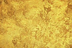 Texture of golden decorative plaster or concrete. Abstract gold grunge background. photo
