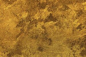 Texture of golden decorative plaster or concrete. Abstract gold grunge background. photo