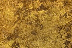 Texture of golden decorative plaster or concrete. Abstract gold grunge background. photo