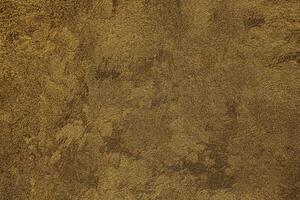 Texture of golden decorative plaster or concrete. Abstract gold grunge background. photo