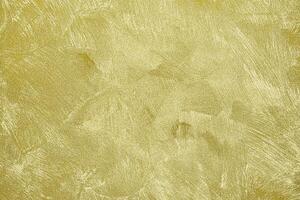 Texture of golden decorative plaster or concrete. Abstract gold grunge background. photo