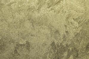 Texture of golden decorative plaster or concrete. Abstract gold grunge background. photo