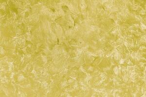 Texture of golden decorative plaster or concrete. Abstract gold grunge background. photo