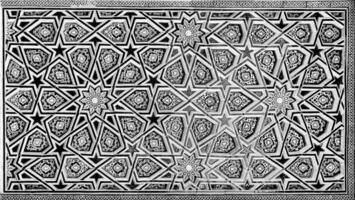 Geometric traditional Islamic ornament. Fragment of a ceramic mosaic. Black and white. photo