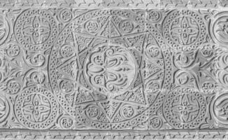 Geometric traditional Islamic ornament. Fragment of a ceramic mosaic. photo