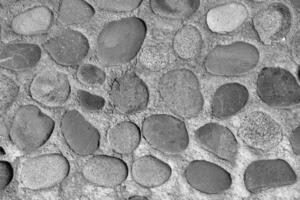 antiguo antiguo Roca pared textura. negro y blanco. foto