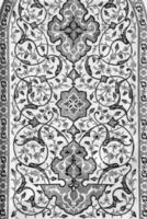 Black and white geometric traditional Islamic ornament on a tile. Fragment of a ceramic mosaic.Abstract background. photo